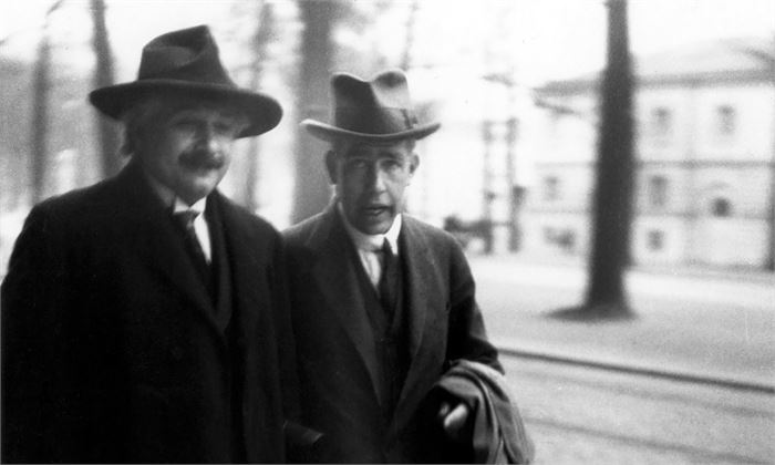 Einstein and Bohr walking in Brussels in 1930 at the 6th Solvay Conference. Einstein is relaxed as if he was sure of victory, but Bohr is nervous. Photographed by Einstein's close friend, Paul Ehrenfest.